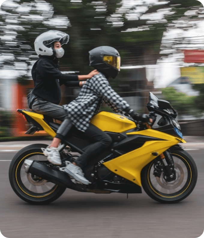 Passengers on a motorcycle